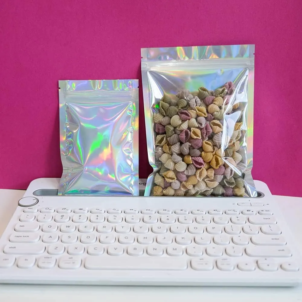100 Pieces Mylar Holographic Resealable Bags - 5.5 x 7.8" Smell Proof Bags, Foil Pouch for Party Favor Food Storage (Holographic Color, 5.5 x 7.8 Inch)