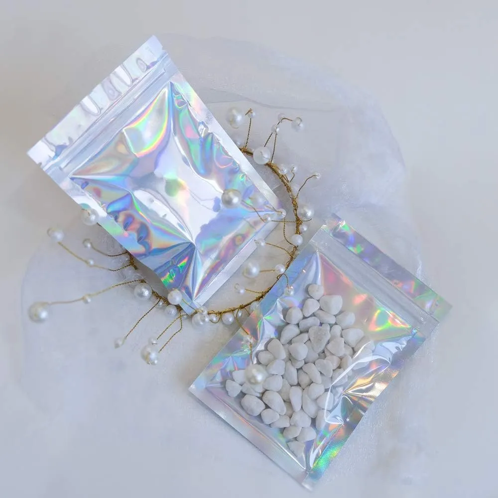 100 Pieces Mylar Holographic Resealable Bags - 5.5 x 7.8" Smell Proof Bags, Foil Pouch for Party Favor Food Storage (Holographic Color, 5.5 x 7.8 Inch)