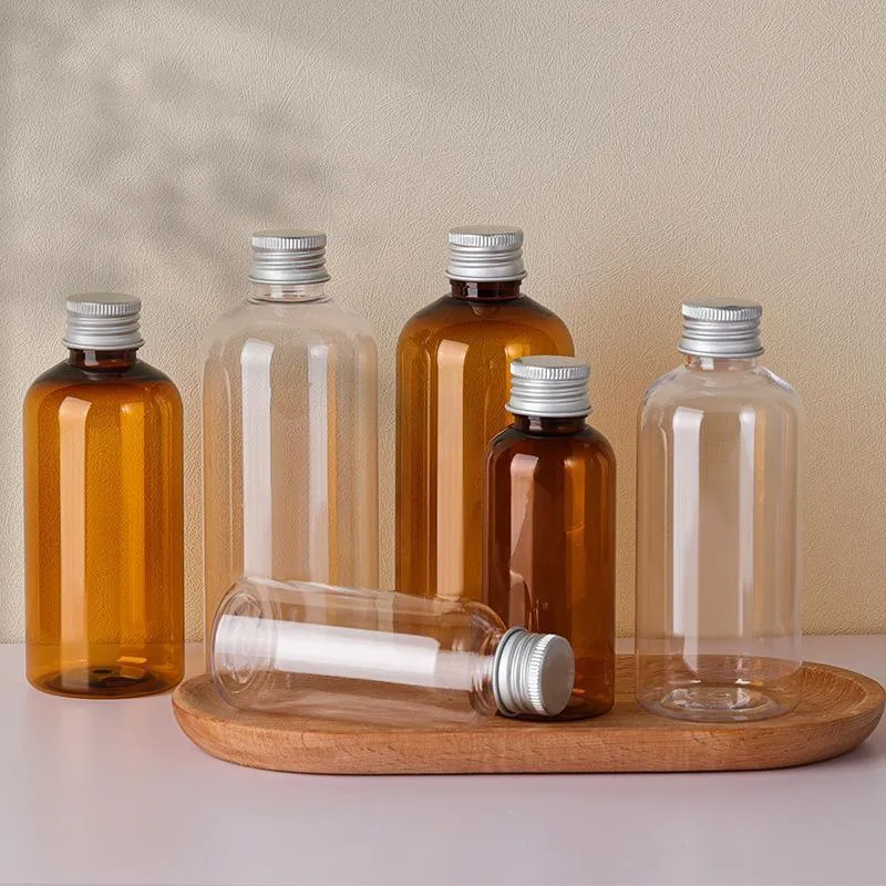 20pcs Brown Transparent Cosmetic Bottles with Aluminum Lids for Packaging